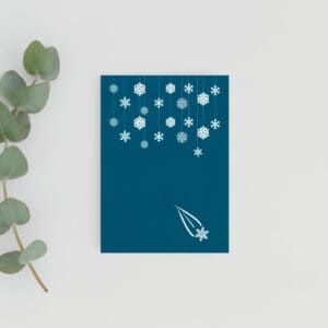 Teal Blue Christmas card with white snowflake designs/christmas decorations and shooting star