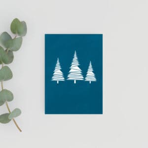 Christmas Tree card.Teal Blue sustainable Christmas card with three snowy white trees in Geometric design