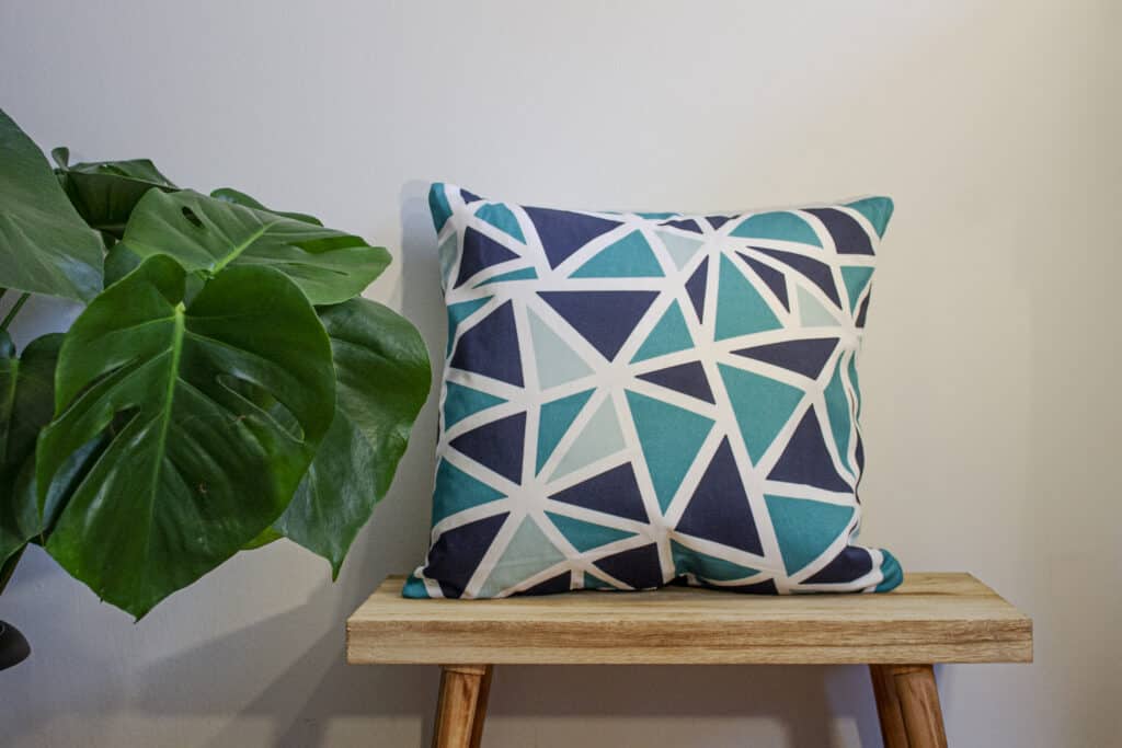 Blue shop geometric cushion